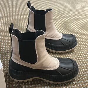 GANNI.  NWT. Size 36
Beige & Black Outdoor Chelsea Boots